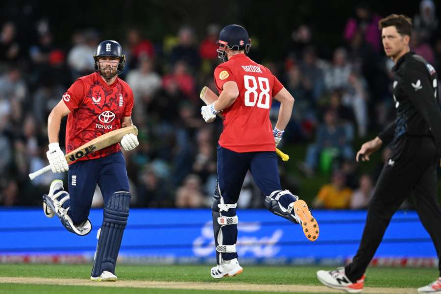 England's Phil Salt, left, and Harry Brook run between the wickets during the second Twenty20 international against New Zealand