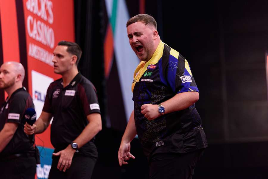 Luke Littler in action against Nathan Aspinall Luke Littler in action against Nathan Aspinall