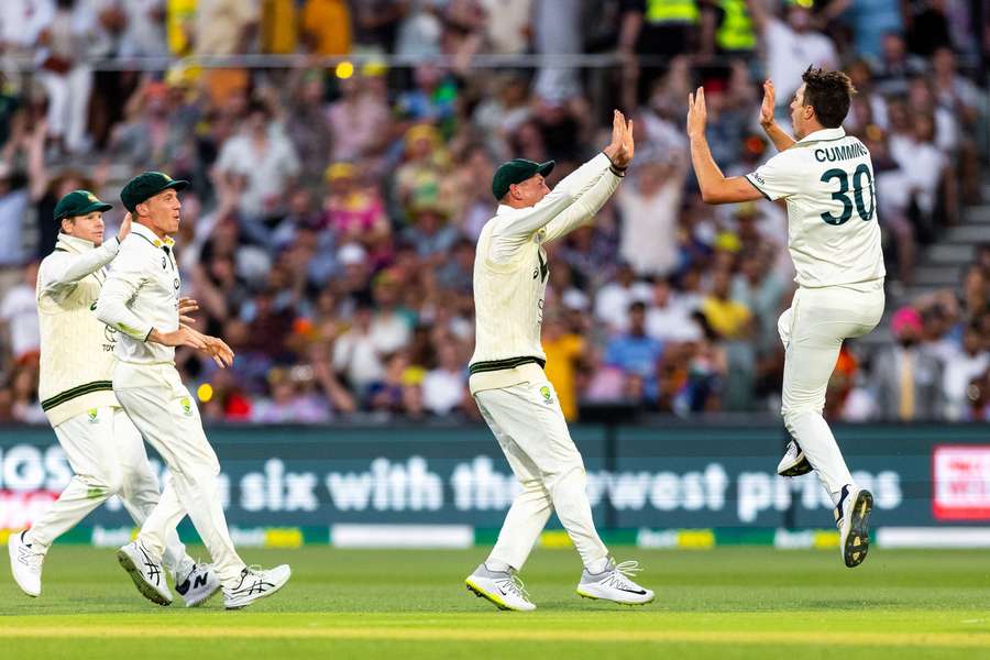 Pat Cummins of Australia celebrates after taking a wicket