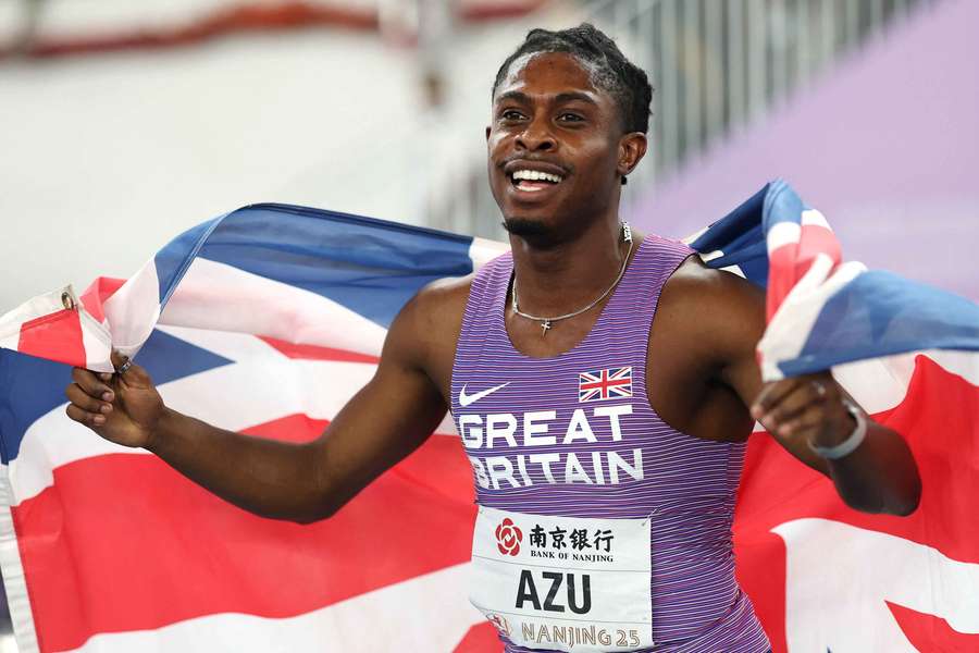 Jeremiah Azu celebrates after winning the men's 60m final in Nanjing