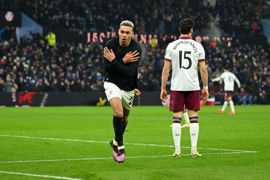 Rogers celebrates after scoring Villa's second goal