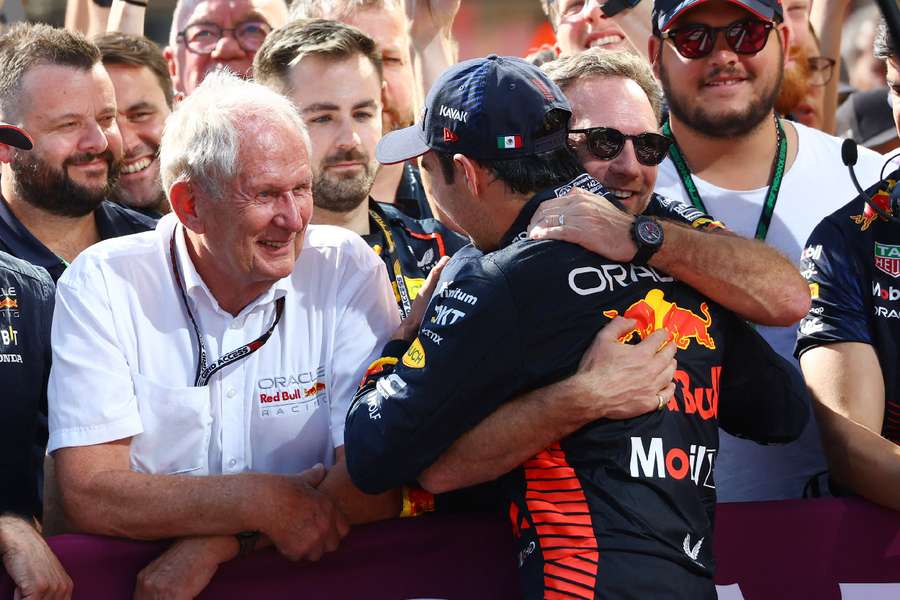 Sergio Perez celebrates with Red Bull team principal Christian Horner after finishing third in the Hungarian Grand Prix