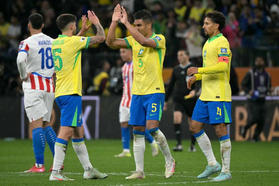 Brazio celebrate beating Paraguay to qualify for the FIFA World Cup next year.
