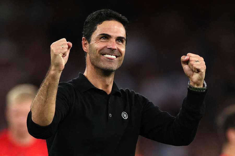 Arsenal's Spanish manager Mikel Arteta celebrates their victory on the pitch