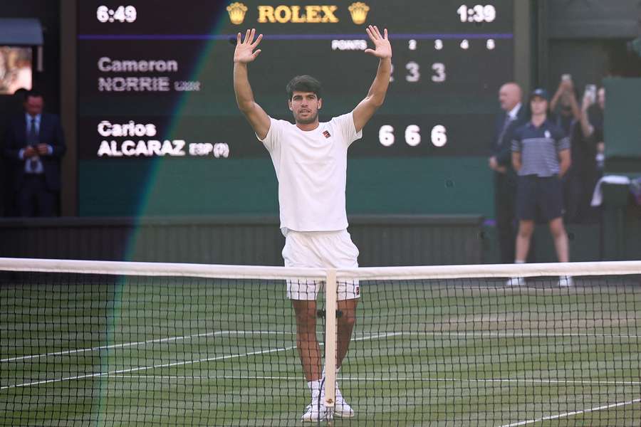 Spain's Carlos Alcaraz celebrates after winning against Britain's Cameron Norrie