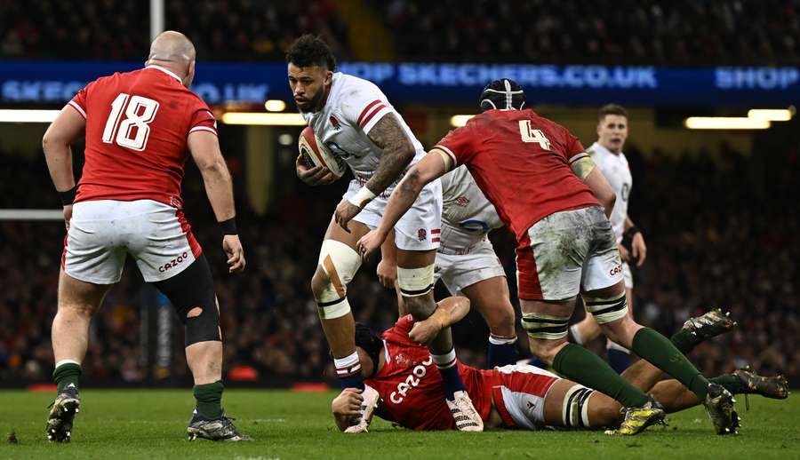 England's Courtney Lawes is tackled during the Six Nations international rugby union match between Wales and England 