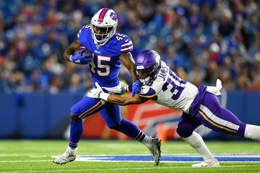 Christian Wade runs with the ball while playing for Buffalo Bills