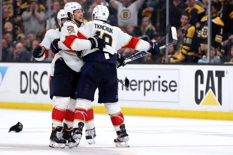 Matthew Tkachuk and Brandon Montour of the Florida Panthers celebrate after defeating the Boston Bruins 4-3 in the first round of the play-offs