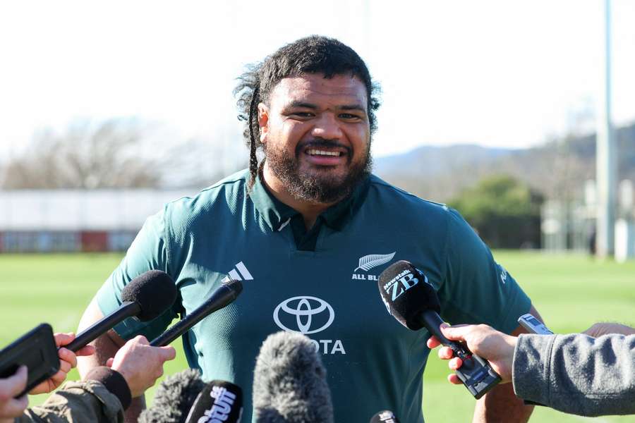 New Zealand prop Pasilio Tosi speaks to the media at an All Blacks training session.
