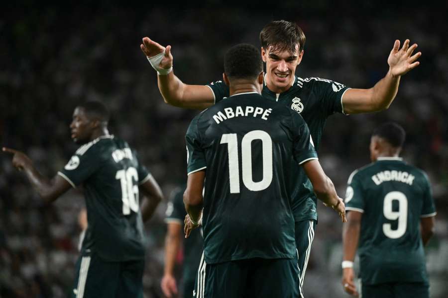 Carlos Espi celebrates his late winner with Kylian Mbappe Carlos Espi celebrates his late winner with Kylian Mbappe