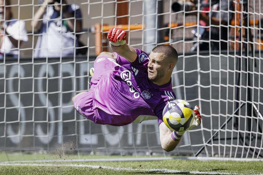 Ajax's Maarten Paes saves Souffian El Karouani's penalty during Sunday's shootout against FC Utrecht Ajax's Maarten Paes saves Souffian El Karouani's penalty during Sunday's shootout against FC Utrecht
