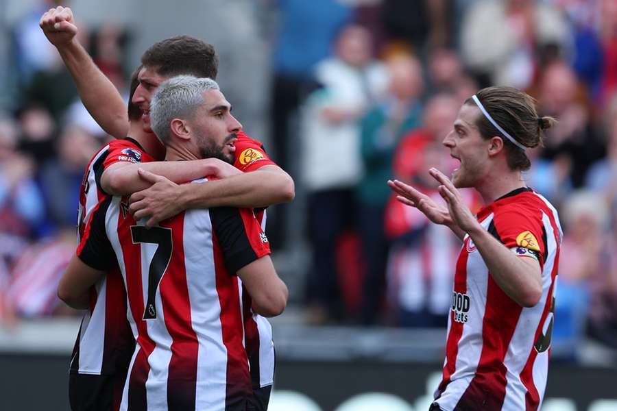 Brentford celebrate after Ollie Arblaster's own goal