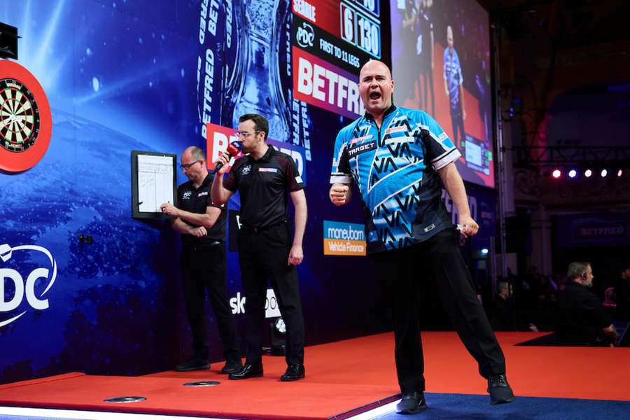 Rob Cross defeated Ryan Searle 11-6 on Wednesday