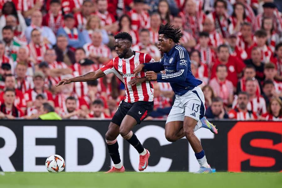 The Atletic Club of VIOKI Williams competes for the ball with Patrick River from Manchester United during the semifinals of Europe First leg League The Atletic Club of VIOKI Williams competes for the ball with Patrick River from Manchester United during the semifinals of Europe First leg League