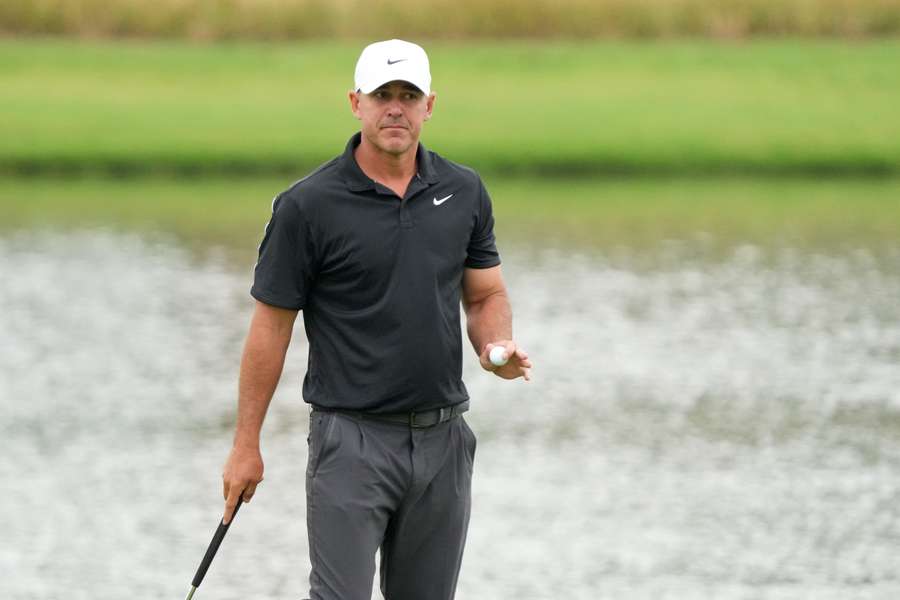 Brooks Koepka reacts after making a birdie on the 14th hole during the first round of the CJ Cup Byron Nelson