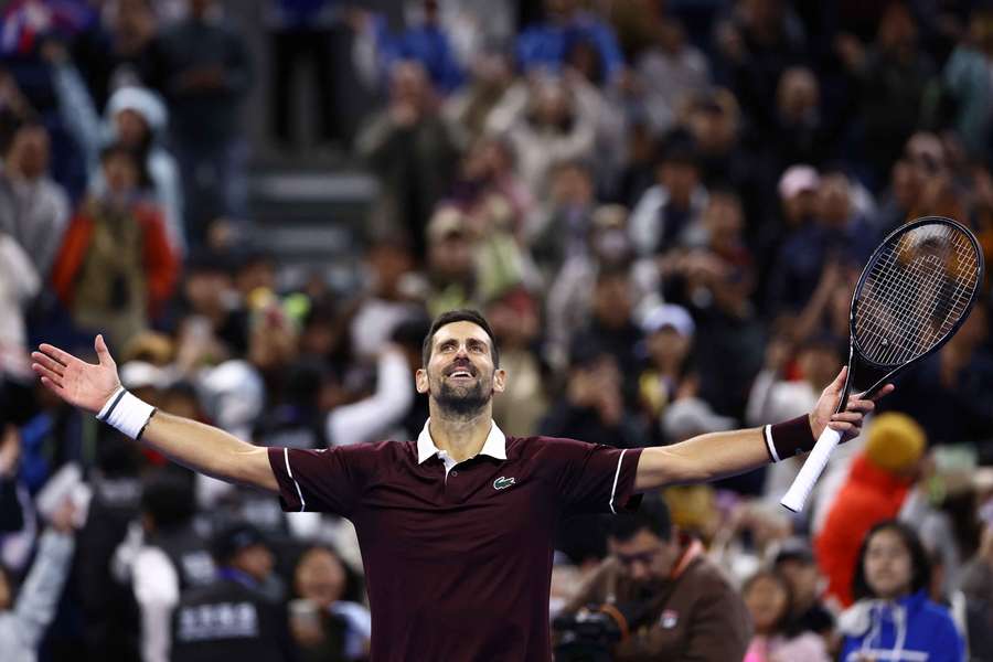 Djokovic celebrates his win Djokovic celebrates his win