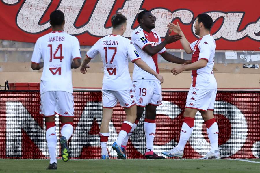 Monaco's French midfielder Youssouf Fofana (C) celebrates after scoring