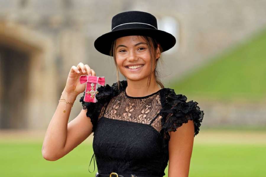 Raducanu poses after being made a Member of the Order of the British Empire Raducanu poses after being made a Member of the Order of the British Empire