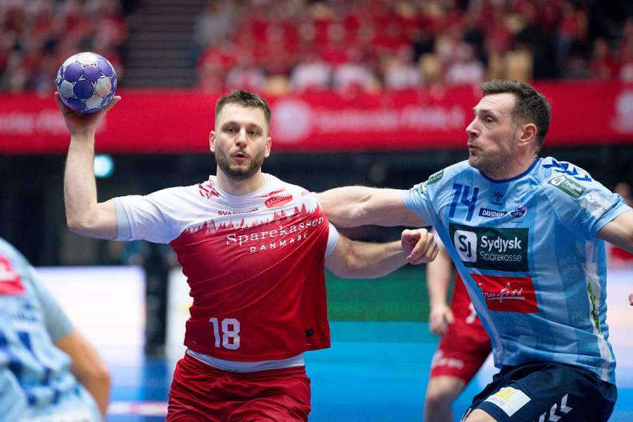 Aalborgs Aleks Vlah in action against SonderjyskEs Jacob Bagersted in the semi-final