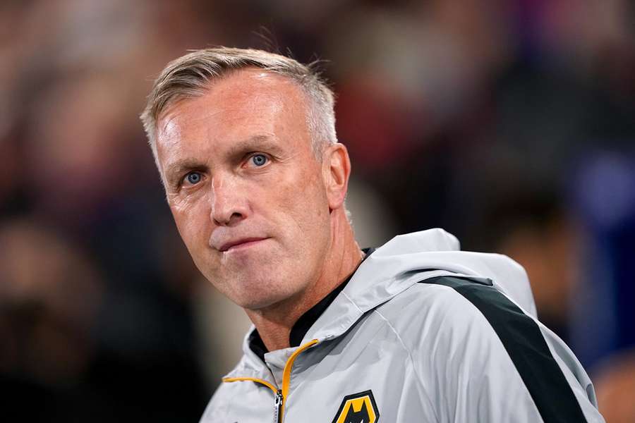 The caretaker boss will remain in the role
