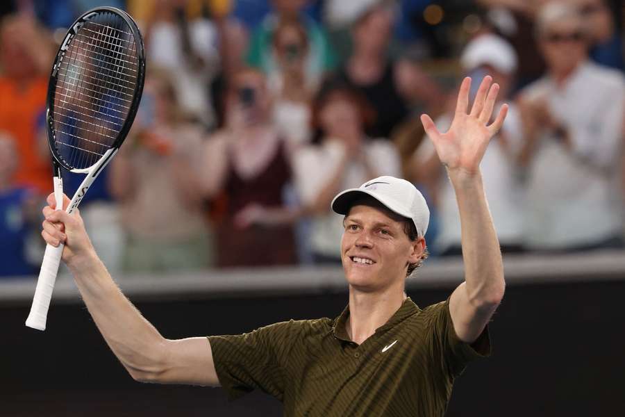 Italy's Jannik Sinner celebrates beating Italy’s Luciano Darderi
