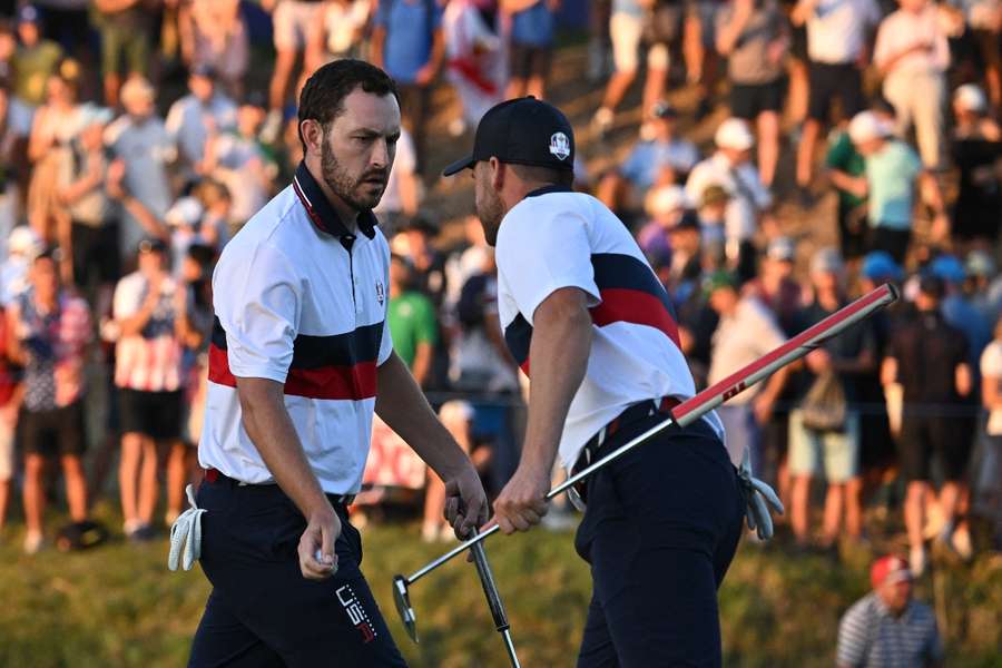 USA's Patrick Cantlay (L) and Wyndham Clark