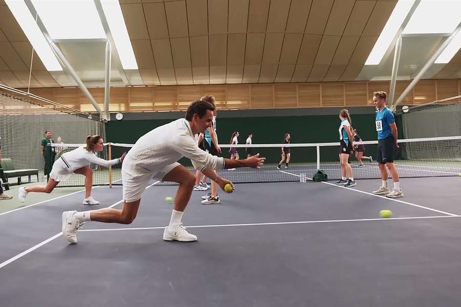 Federer e la Principessa del Galles, con alcuni dei raccattapalle di Wimbledon