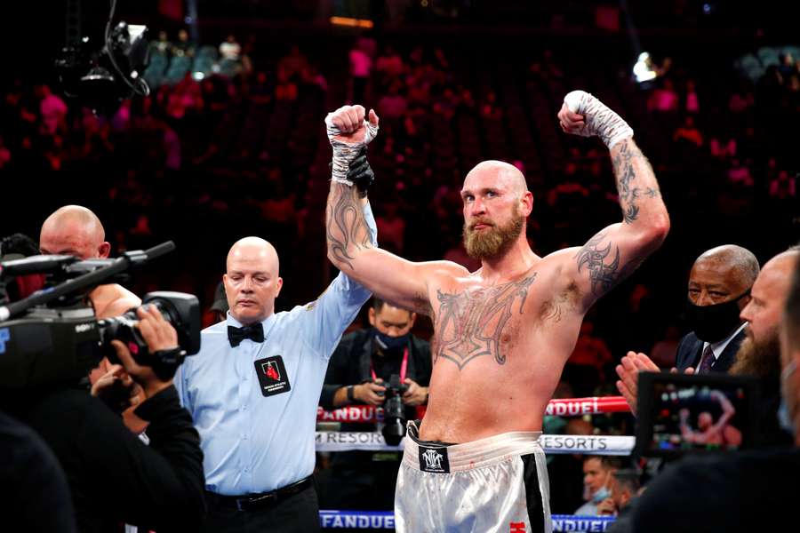 Finland's Robert "The Nordic Nightmare" Helenius is declared the winner after defeating Poland's Adam Kownacki