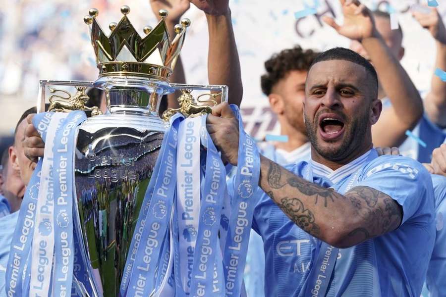 Kyle Walker celebrates winning the Premier League title last season