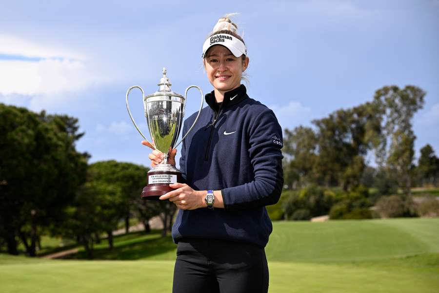 Nelly Korda celebrates with the trophy