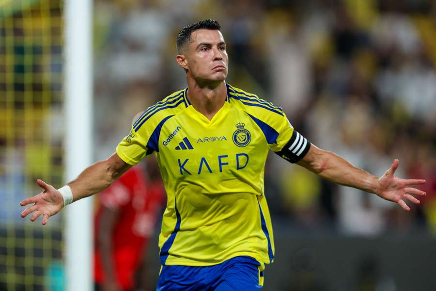 Cristiano Ronaldo of Al Nassr celebrating scoring a goal