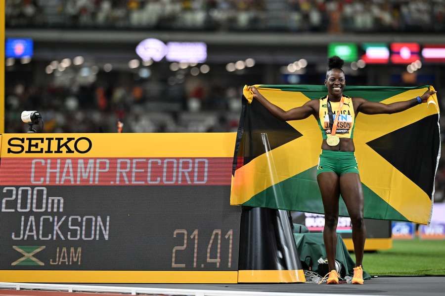 Shericka Jackson celebrates winning the women's 200m final