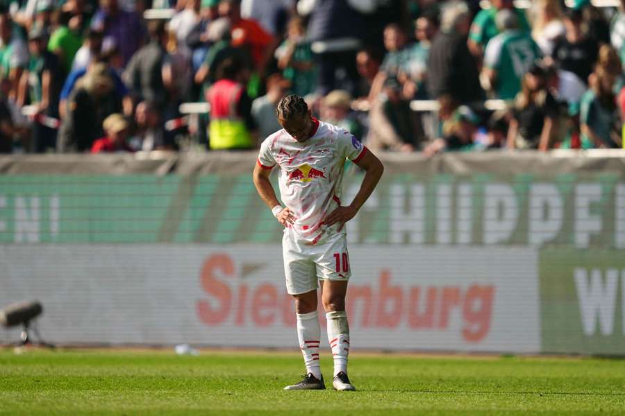 Xavi Simons hangs his head after the match