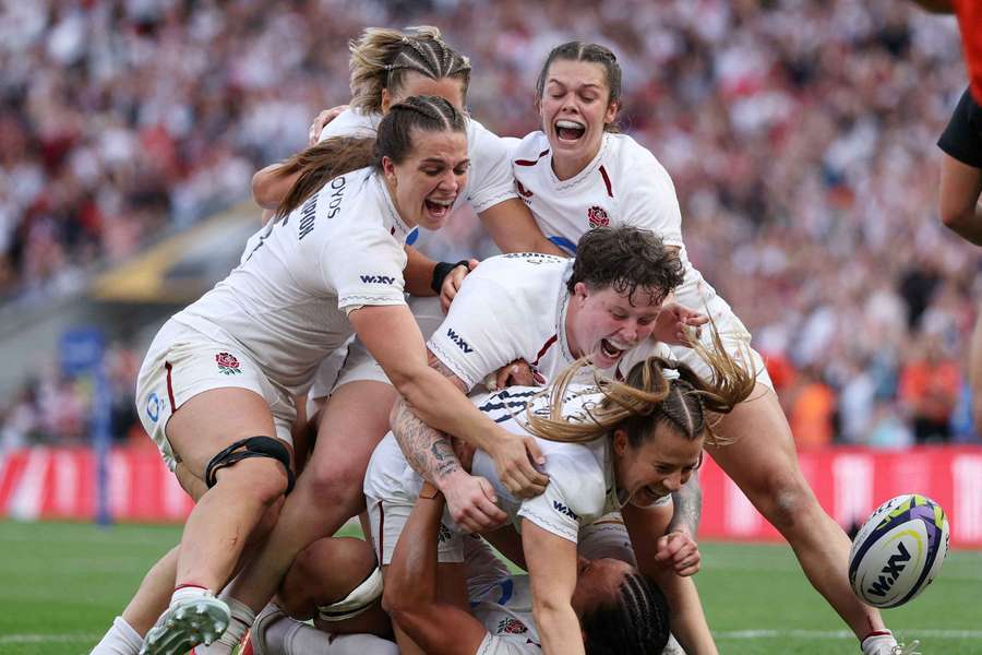 England's Zoe Harrison celebrates scoring their fourth try England's Zoe Harrison celebrates scoring their fourth try