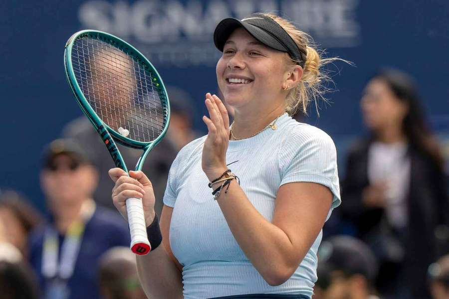 Anisimova reacts after her win