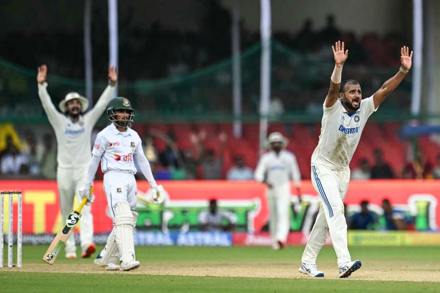 India's Akash Deep (right) unsuccessfully appeals for leg before wicket against Bangladesh's Mominul Haque on day one in Kanpur