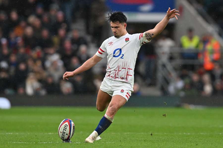 England's fly-half Marcus Smith kicks a penalty during the Six Nations