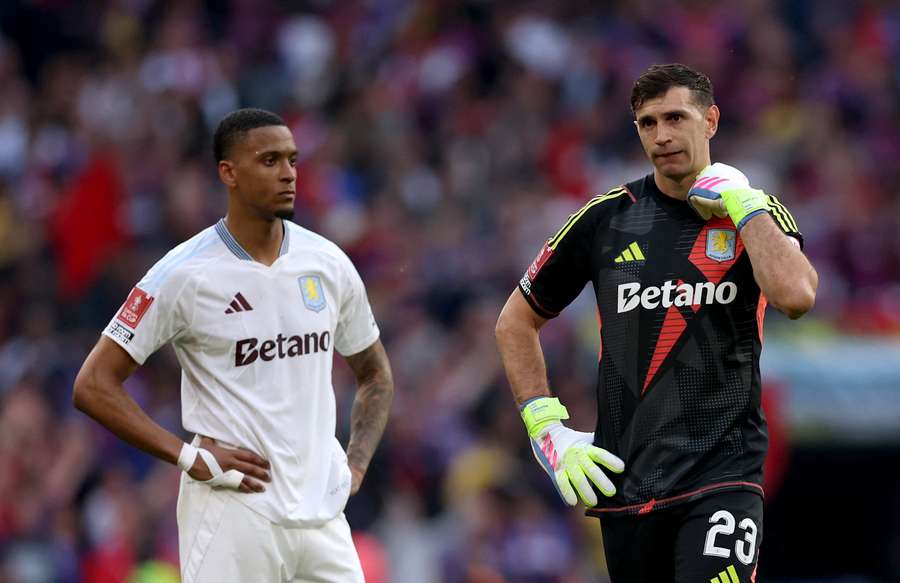 Ezri Konsa and Emiliano Martinez in action for Aston Villa