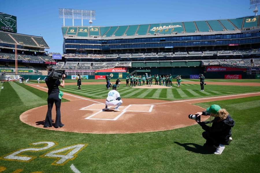 A view of the ceremonial first pitch on Jackie Robinson Day before the game between the New York Mets and the Oakland Athletics A view of the ceremonial first pitch on Jackie Robinson Day before the game between the New York Mets and the Oakland Athletics