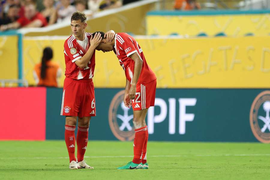 Musiala is embraced by teammate Kimmich 