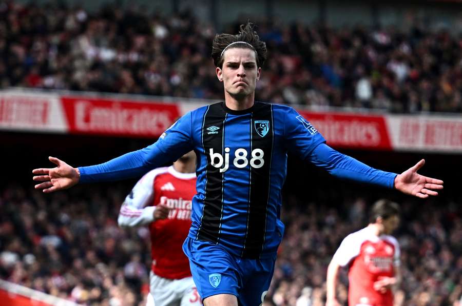 Alex Scott celebrates scoring Bournemouth's winning goal against Arsenal