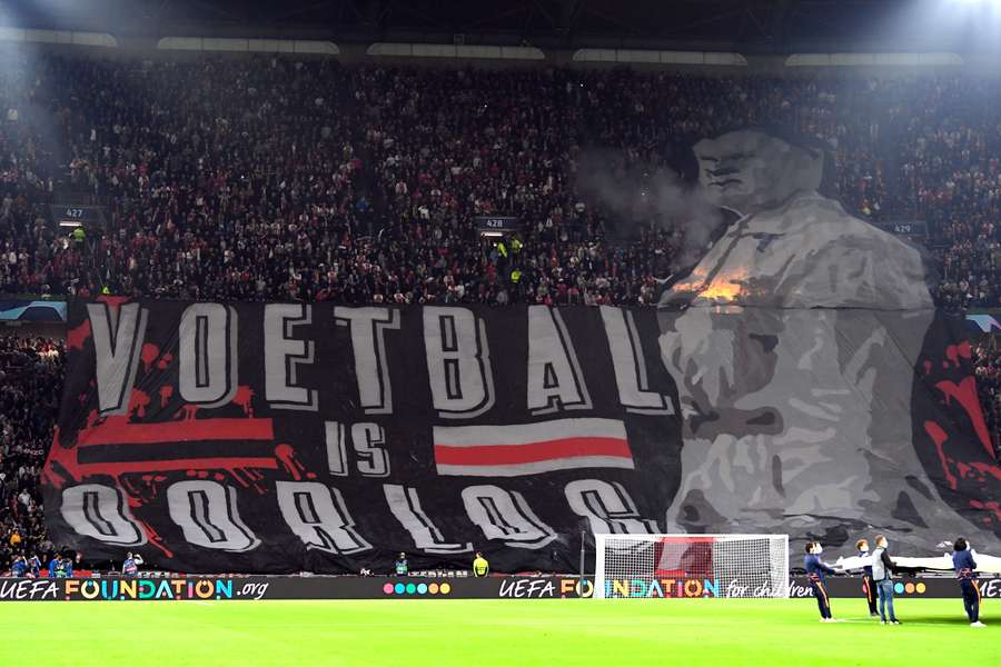 Ajax fans display a banner