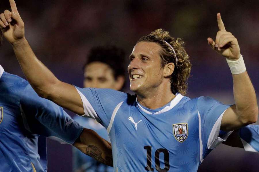 Uruguay's Diego Forlan celebrates scoring against Paraguay in a World Cup qualifier in 2011 Uruguay's Diego Forlan celebrates scoring against Paraguay in a World Cup qualifier in 2011