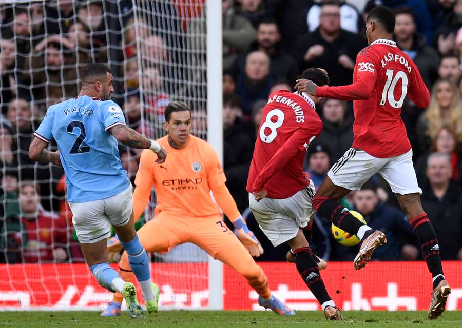 Marcus Rashford watches as Manchester United's Portuguese midfielder Bruno Fernandes scores the equalising goal