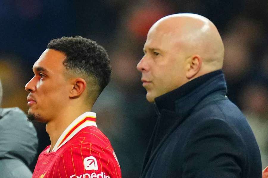 Trent Alexander-Arnold alongside Liverpool manager Arne Slot