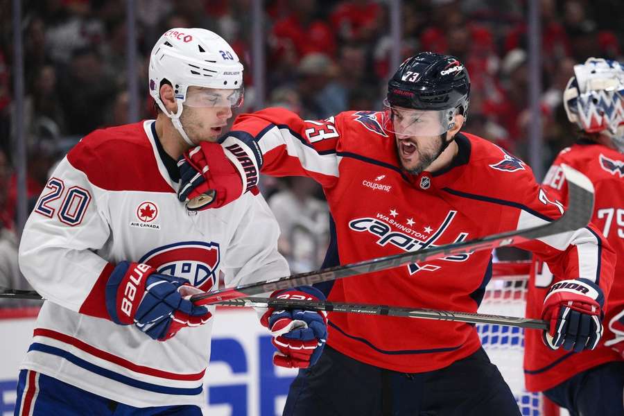 Capitals' Vincent Desharnais battles with Canadiens' Juraj Slafkovsky Capitals' Vincent Desharnais battles with Canadiens' Juraj Slafkovsky