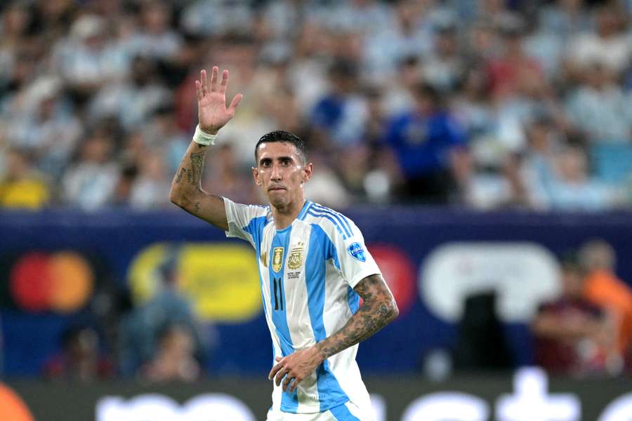 Argentina's forward #11 Angel Di Maria acknowledges supporters as he leaves the pitch