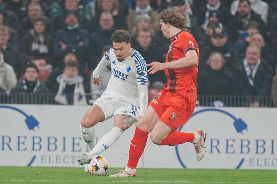 FC Copenhagens Jordan Larssson challenges FC Midtjylland Mads Bech Andersen