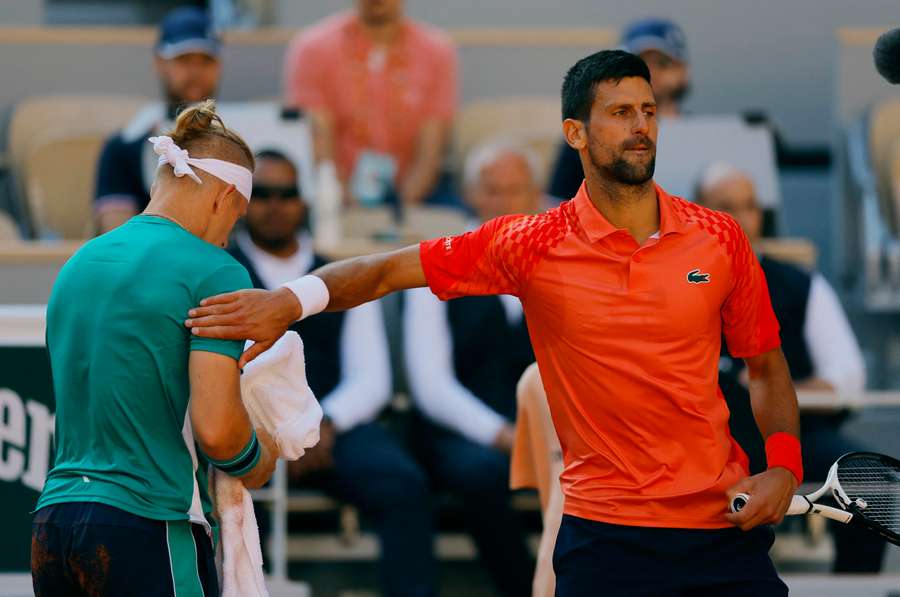 Novak Djokovic consoles Alejandro Davidovich Fokina after their match