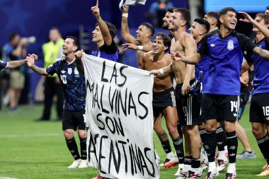 Argentina players celebrate together Argentina players celebrate together